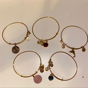 Collection of 5 Gold Alex & Ani bracelets